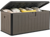 Large deck box in black and brown, made of weatherproof HDPE, ideal for storing pillows and garden tools outdoors.