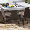Bar height patio swivel bar stools in brown PE rattan with cushioned seats, ideal for backyard or poolside use.