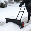 29-inch heavy-duty metal snow pusher with adjustable head for flexible handling and efficient snow clearing on.