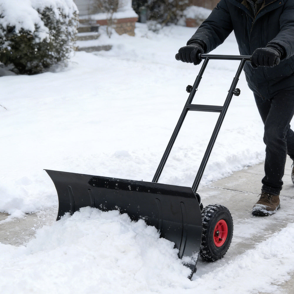 29-inch heavy-duty metal snow pusher with adjustable head for flexible handling and efficient snow clearing on.