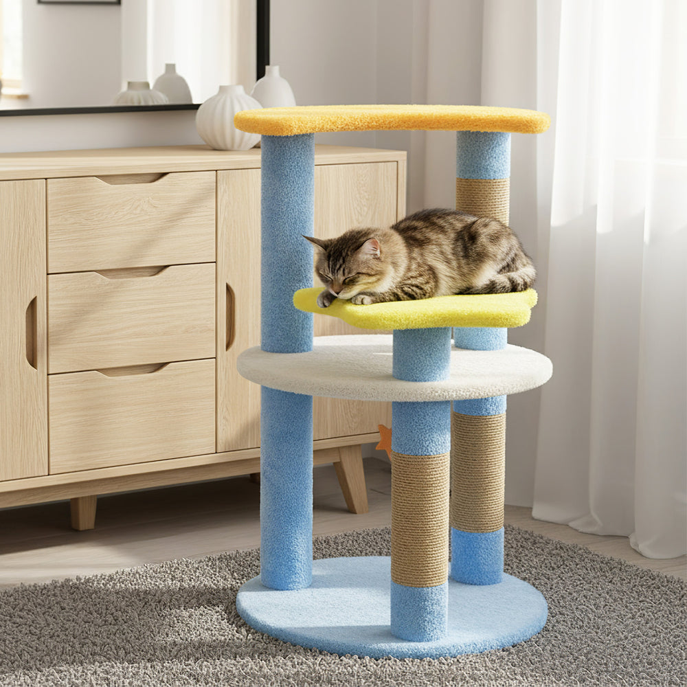 Modern 29-inch cat tree in blue with star and moon platforms, featuring scratching posts and plush fabric for comfort.
