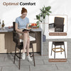 29-inch patio swivel bar stool with brown PE rattan, ergonomic backrest, and soft white cushion for outdoor comfort.