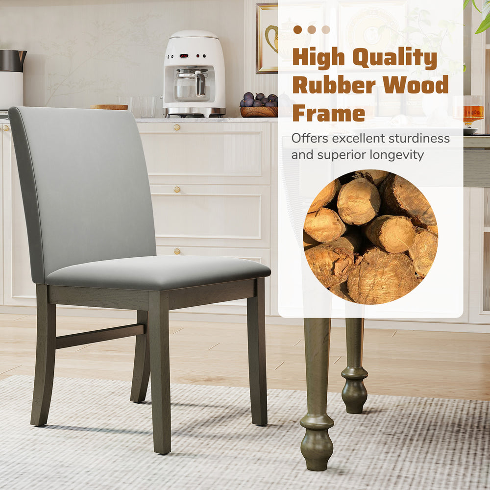Upholstered dining chair with gray velvet fabric and rubber wood frame, designed for comfort and durability in dining.