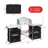 Folding camping table with storage organizer, black, featuring two side tables and large countertop for outdoor cooking.