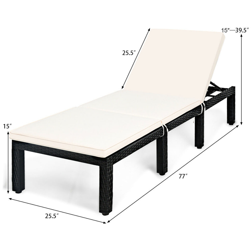 Height-adjustable patio rattan lounge chair with white cushion, ideal for poolside or garden relaxation.