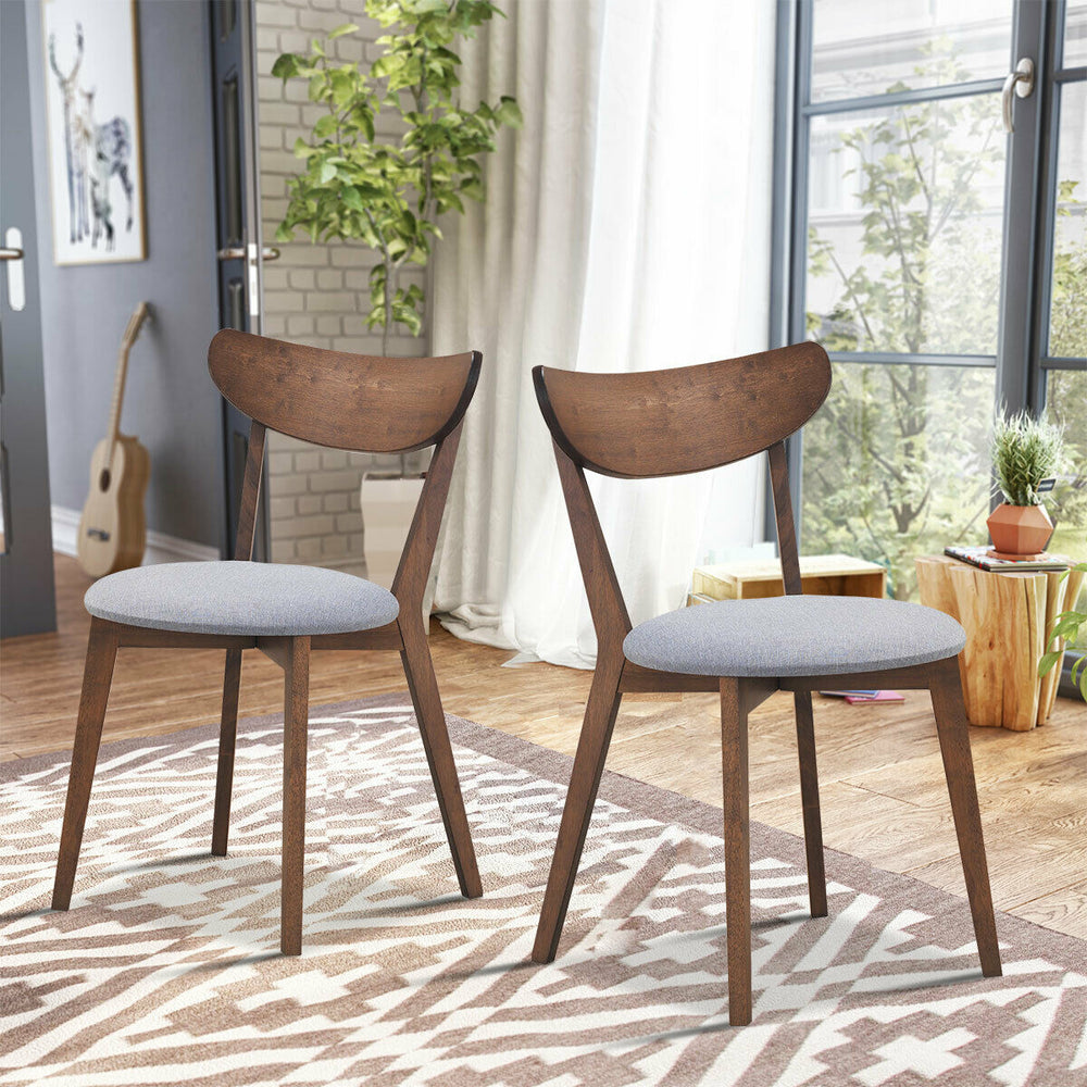 Set of 2 dining chairs with upholstered seats and curved backs, featuring solid rubber wood legs for comfort and style.