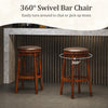 Set of 2 29-inch swivel bar stools in classic walnut color, featuring PU leather padding and a sturdy rubberwood base.
