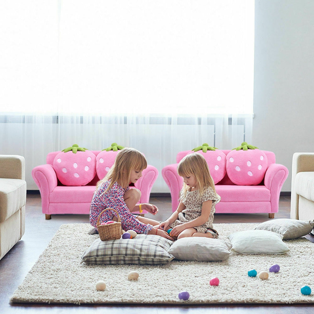 Kids strawberry armrest chair sofa in pink with two cute strawberry pillows, perfect for children's entertainment and.
