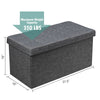 Foldable dark gray storage ottoman with removable bin, sturdy MDF frame, 31.5 inches, ideal for living room or bedroom.