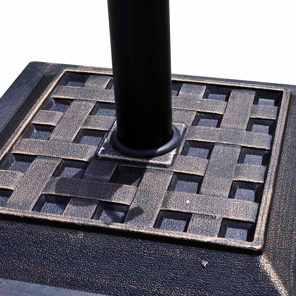 Heavy-duty 17.5-inch square umbrella base with decorative bronze finish, designed for outdoor stability and rust.