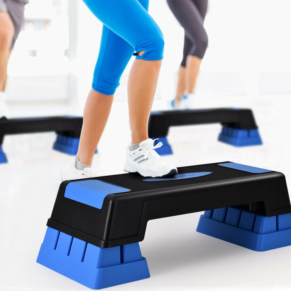 Aerobic exercise stepper trainer in blue with adjustable height, ideal for various workouts and enhancing.