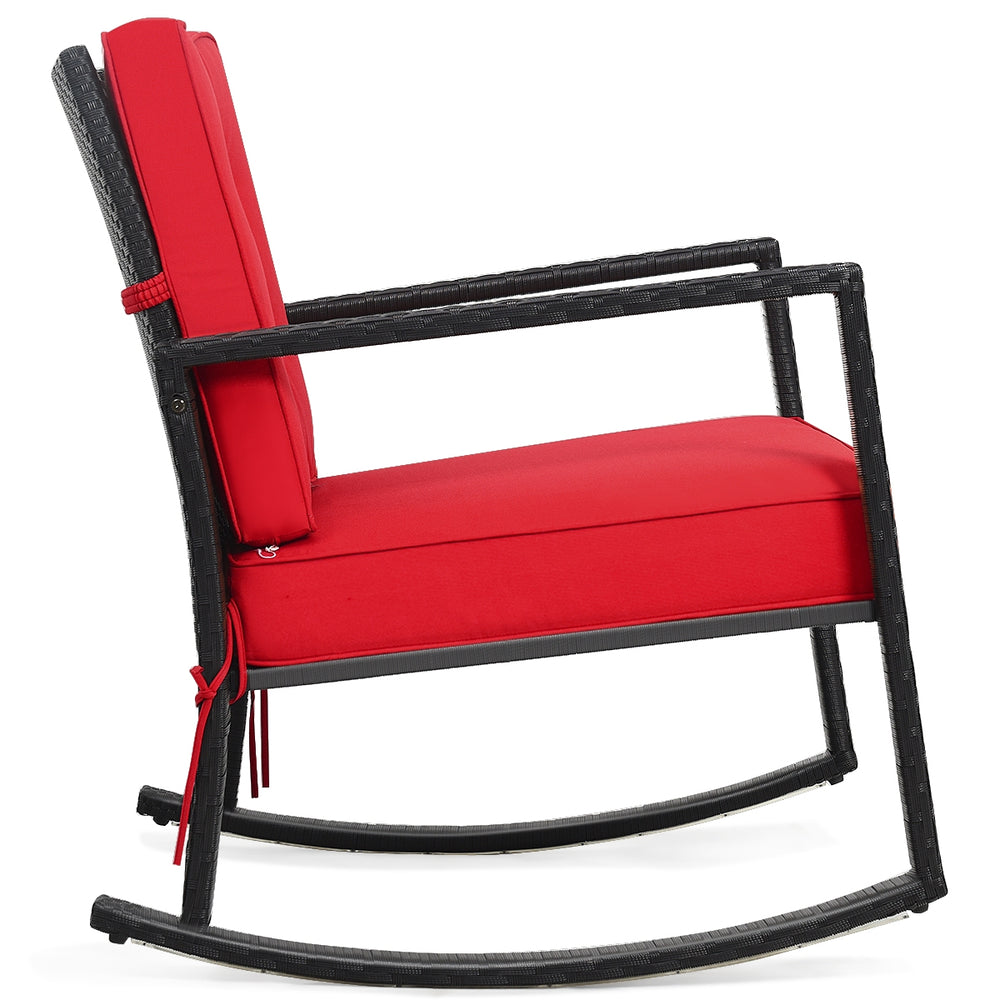 Red cushioned patio rattan rocking chair with sturdy metal frame, designed for outdoor relaxation and comfort.