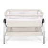 Portable baby bedside sleeper in beige with adjustable height and angle, featuring a cotton mattress cover for comfort.
