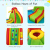 Brightly colored inflatable water slide bounce park with climbing wall, water slides, and lounge chair for outdoor fun.