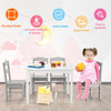 Kids 5-piece wooden table and chair set in white, perfect for playroom activities, featuring rounded corners for safety.