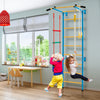 Kids indoor gym playground featuring a wall ladder, pull-up bar, and gymnastic rings for active play and fitness.