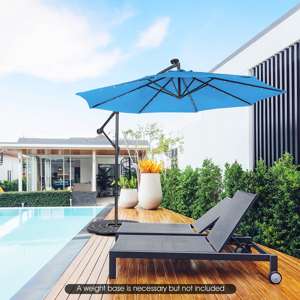 Blue 10 feet patio solar-powered cantilever umbrella with tilting system, ideal for outdoor relaxation by the pool.