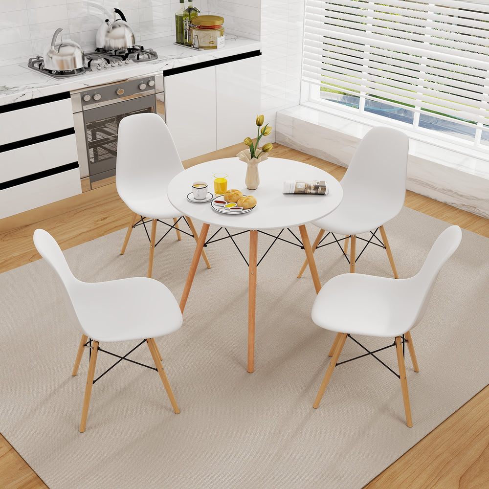 Round modern dining table with solid wooden legs, 31.5 inches, designed for compact spaces, ideal for dining or working.