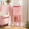 Pink jewelry cabinet with 5 drawers, mirror lift-top, and necklace hooks for organized storage in a stylish design.