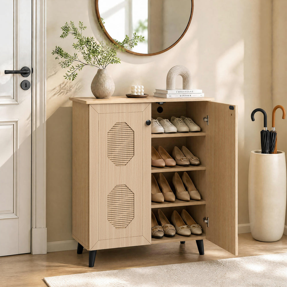Freestanding 2-door storage cabinet with carved panels, designed for organizing footwear in entryways or hallways.