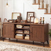 Mid-century modern 2-door TV stand in brown, featuring adjustable shelves and open compartments for versatile storage.