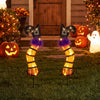 Lighted witch legs with purple trim and tinsel, featuring 30 warm white LEDs for festive Halloween outdoor decoration.