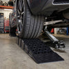 Low-profile car ramp set lifts vehicles 2.5"/6.5 cm for maintenance, featuring anti-slip texture and 22,000 lbs capacity.