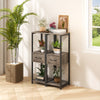 Three-tier gray metal plant stand with drawers, featuring faux wood grain, ideal for displaying plants and ornaments.