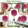 Artificial azalea tree with vivid blooming flowers in a cement-weighted pot, ideal for indoor decoration in various.