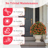 Artificial red rose topiary ball tree in a cement base, requiring no maintenance, perfect for front porch decoration.