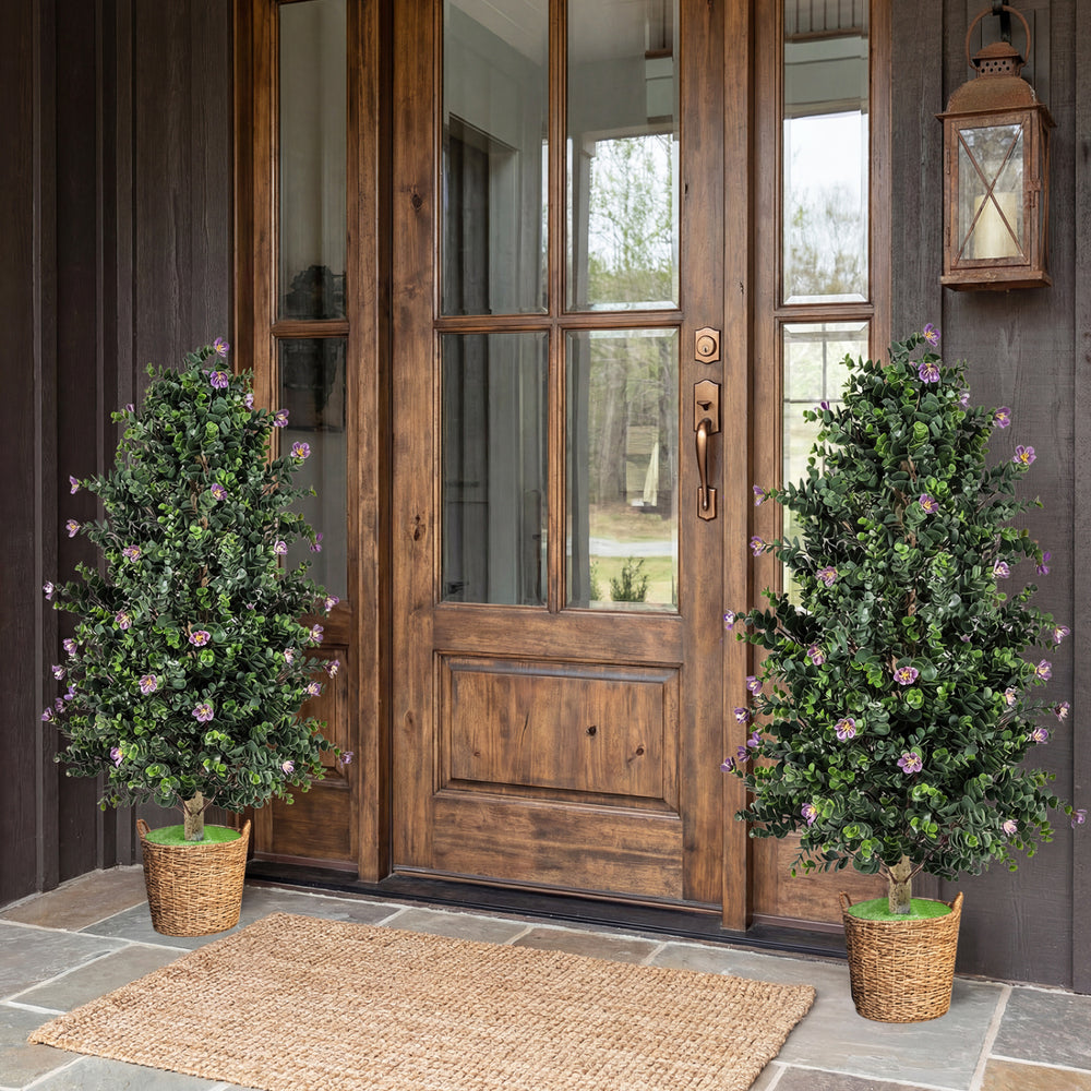 Two potted artificial topiary cone trees with 49 purple flowers, perfect for enhancing entryways or living spaces.