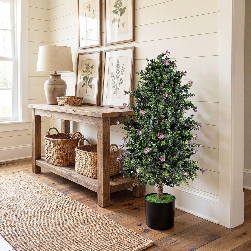 Artificial topiary cone tree with 49 purple flowers in a cement-filled pot, perfect for home or office decor.
