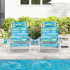 Two folding beach chairs with adjustable positions in blue and green, perfect for outdoor relaxation by the pool.