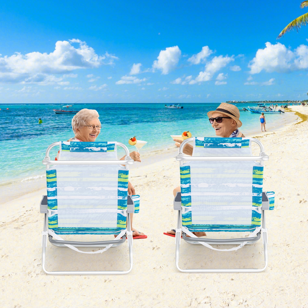 Folding beach chairs with adjustable positions and head pillows, perfect for relaxing by the ocean.