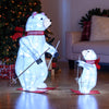 Animated skiing polar bears decoration with 160 bright LEDs and festive red scarves, perfect for holiday displays.