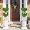 Two teddy bear topiary trees with golden bows, made of sun-resistant faux boxwood, perfect for outdoor spring displays.