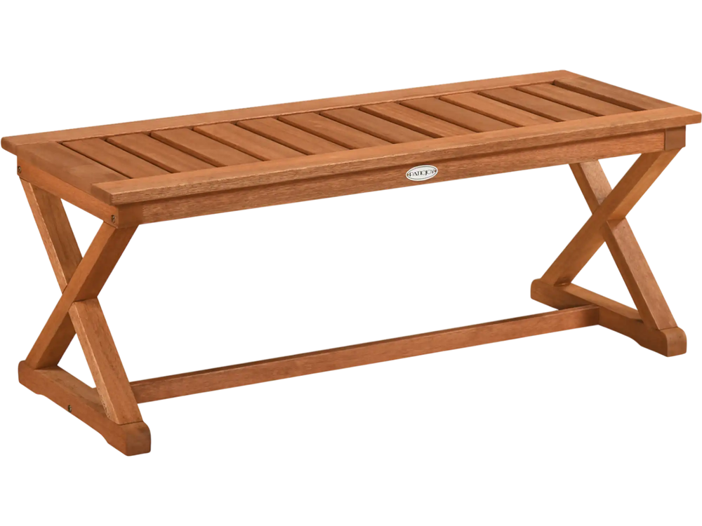 Outdoor bench with slatted seat and cross legs, made of hardwood with teak finish, suitable for patio or balcony use.