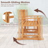 Acacia wood glider bench showcasing smooth gliding motion and sturdy design, perfect for outdoor relaxation.