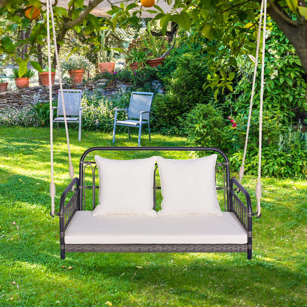 Gray 2-person outdoor hanging chair with soft cushions, suitable for gardens and backyards, featuring durable PE wicker.