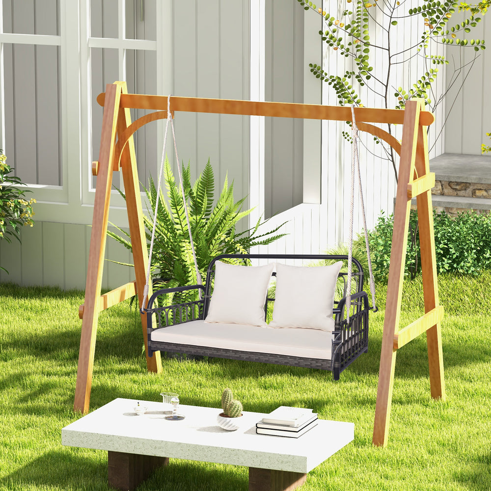 Gray 2-person outdoor hanging chair with soft cushions and durable PE wicker, perfect for garden relaxation.