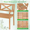 Cozy armrests and slatted seat of the 2-person acacia wood garden chair for comfortable outdoor lounging.