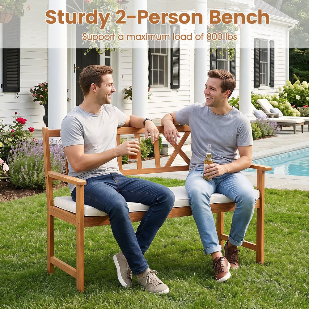 2-person patio bench made of acacia wood with removable cushion, supporting up to 800 lbs, ideal for gardens and porches.