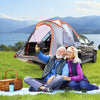 Portable pickup tent for 2-3 people with detachable cover, set up near a lake for outdoor adventures.