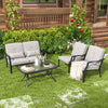 Two ergonomic patio metal chairs with soft cushions and a coffee table, perfect for backyard relaxation.