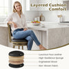 Gray upholstered swivel counter stool with faux leather seat, designed for comfort and easy cleaning in dining areas.