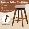 Backless swivel barstool with beige linen seat and rubber wood legs, perfect for counter heights of 35"-39".