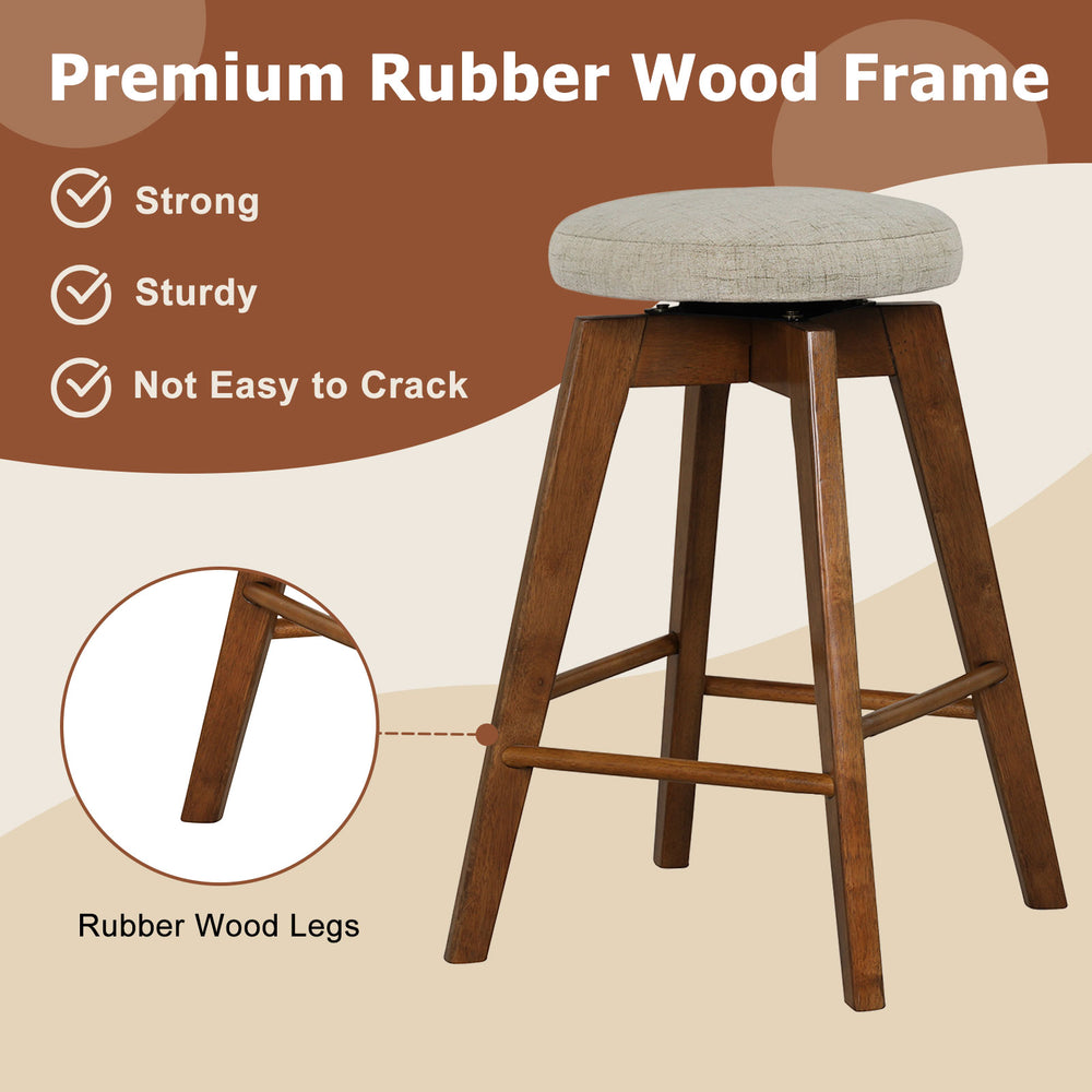 Backless swivel barstool with beige linen seat and rubber wood legs, perfect for counter heights of 35"-39".
