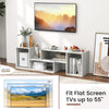 Adjustable white TV stand with storage cubes, fitting TVs up to 55 inches, ideal for modern living room setups.