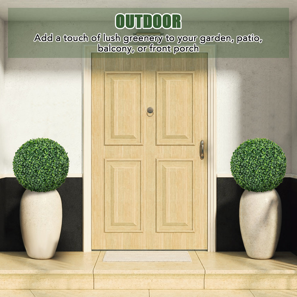 Artificial boxwood topiary balls in decorative pots, perfect for enhancing your patio, garden, or front door area.