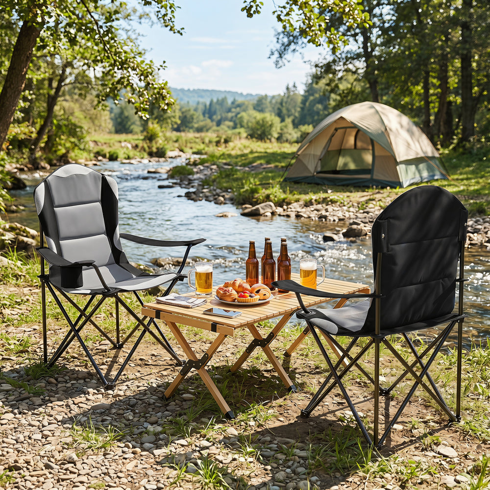 Two black folding camping chairs with cup holders, made of durable 600D Oxford fabric, ideal for outdoor gatherings.